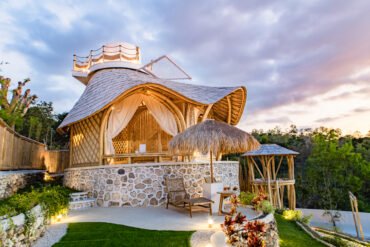 Romantic bamboo villa with rooftop net and tropical garden in Nusa Penida at sunset – eco-luxury stay at Camanta Penida-best-nusa-penida-villa-2026